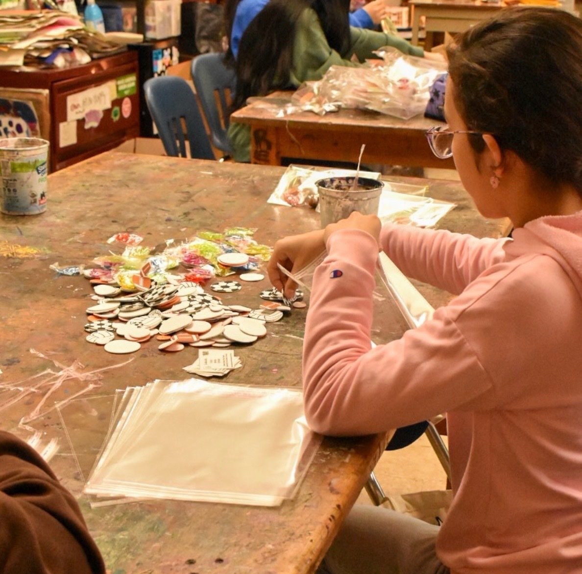 A member bagging the finished physical-activity kits