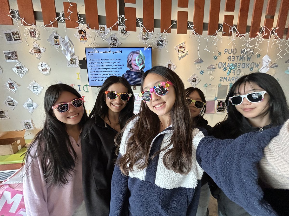 Members at the sunglasses booth